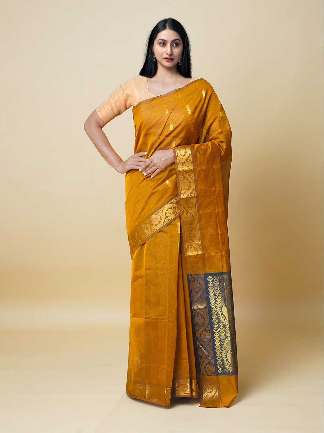 

Unnati Silks Woven Design Zari Pure Cotton Handloom Gadwal Saree, Yellow
