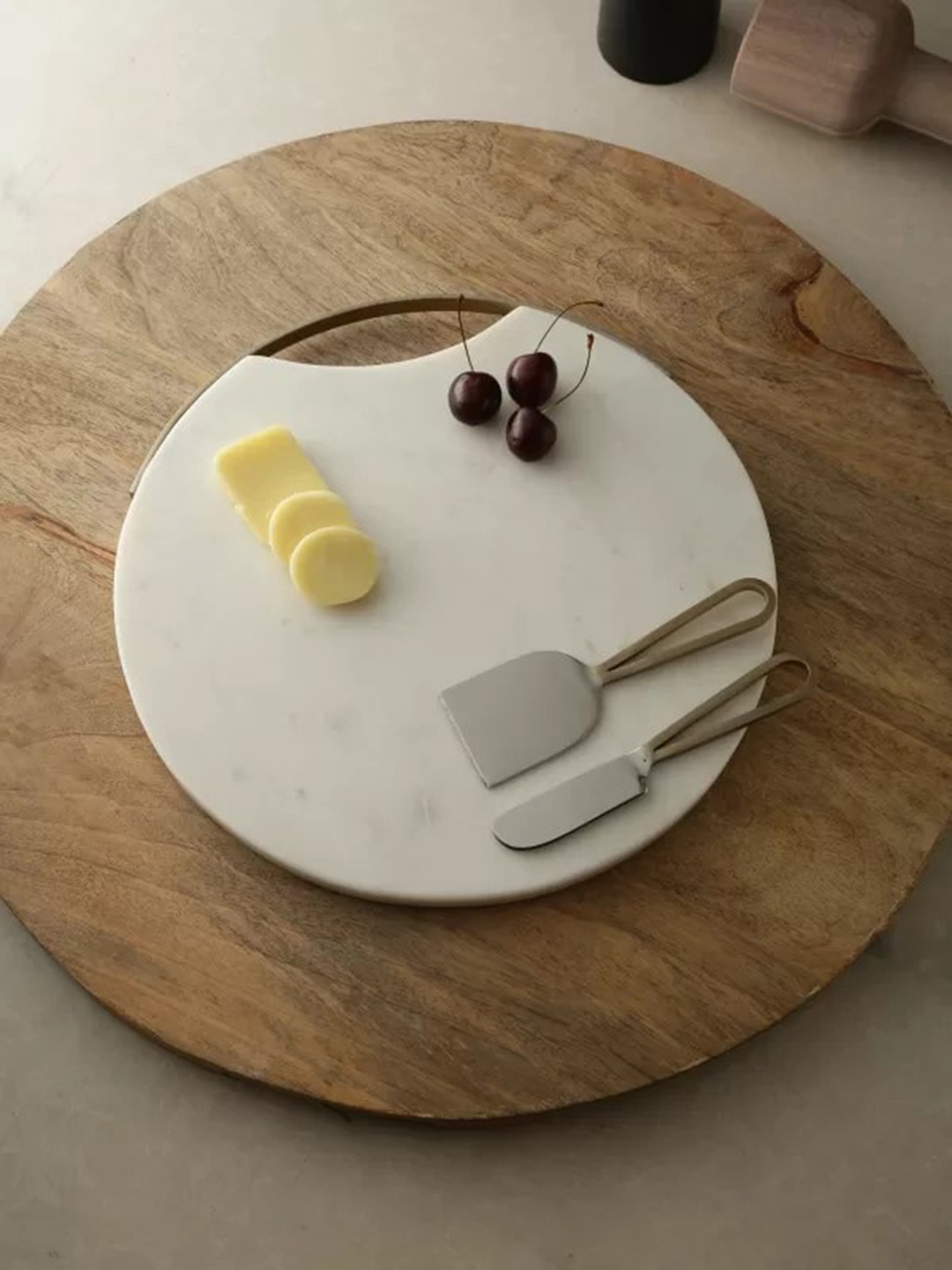 

Amoliconcepts White Cheese Board Cum Platter With Handle & Cheese Cultery
