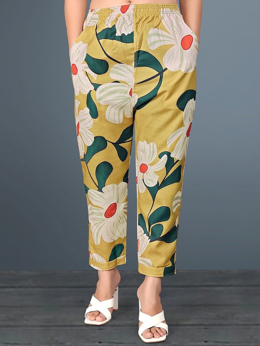 

Ziva Fashion Women Floral Printed Relaxed Flared Trousers, Mustard