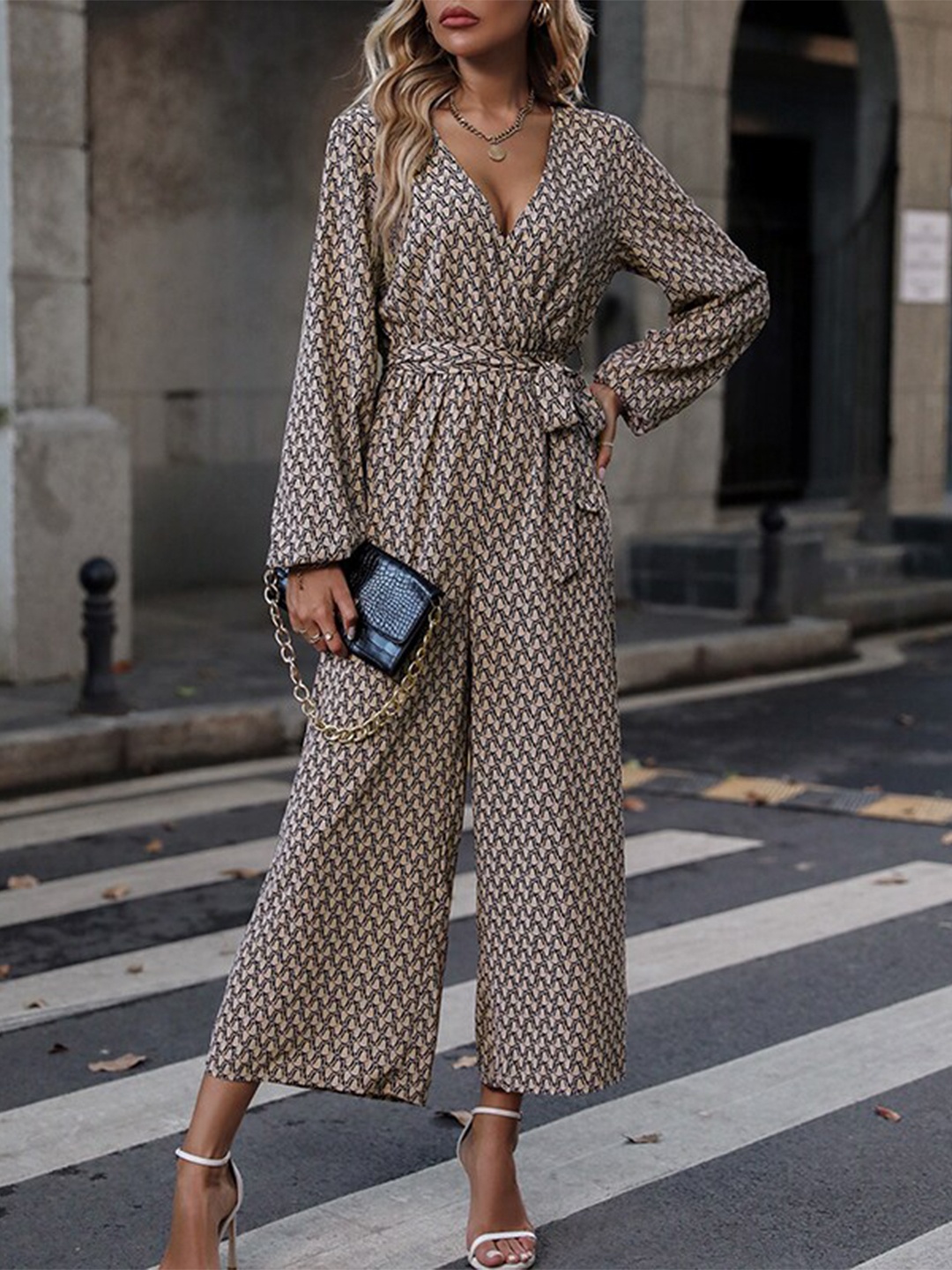 

StyleCast Beige Printed V-Neck Long Sleeves Waist Tie-Ups Basic Jumpsuit