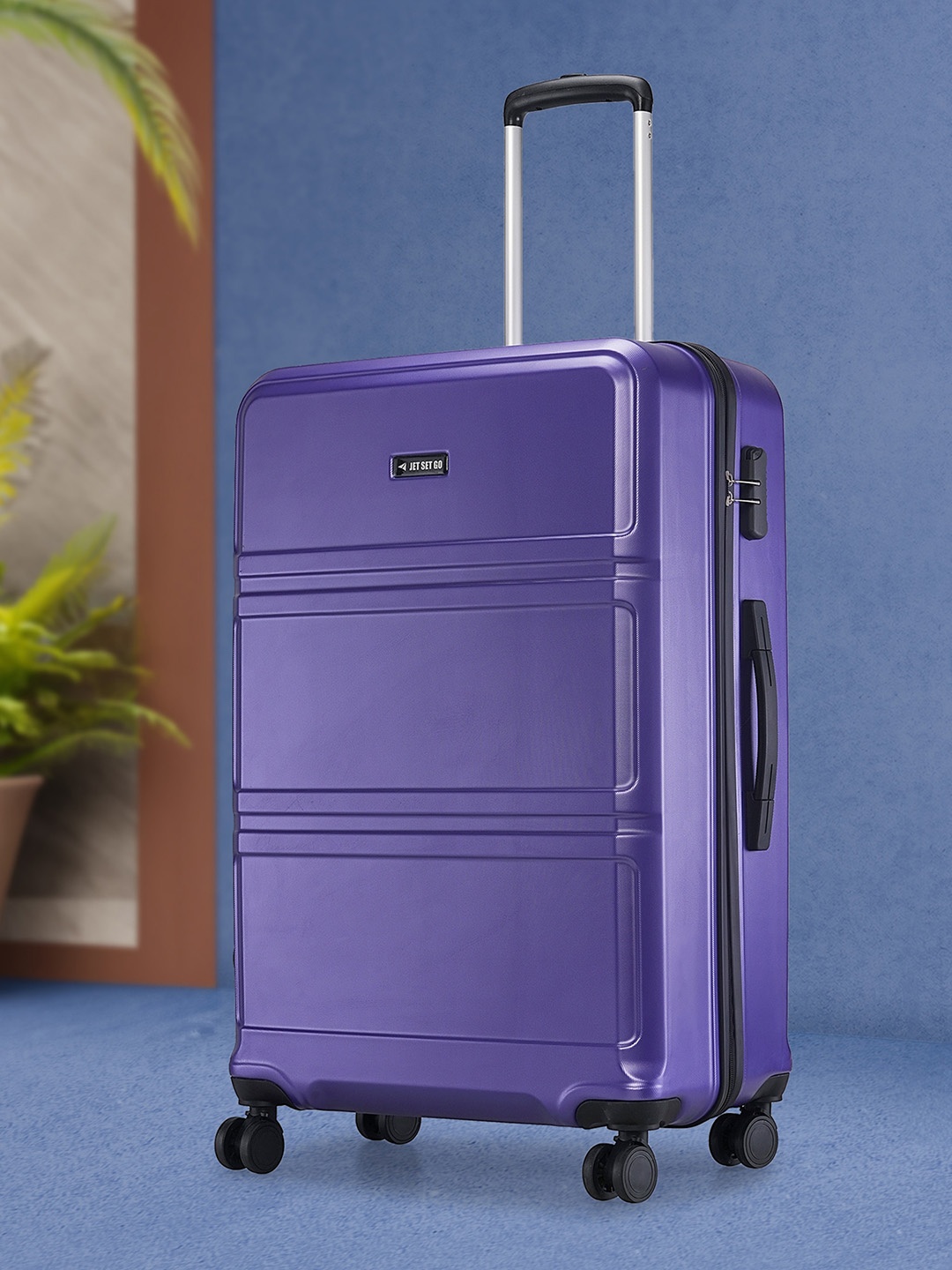 

Jet Set Go Dollar Textured Hard-Sided Large Trolley Bag, Purple