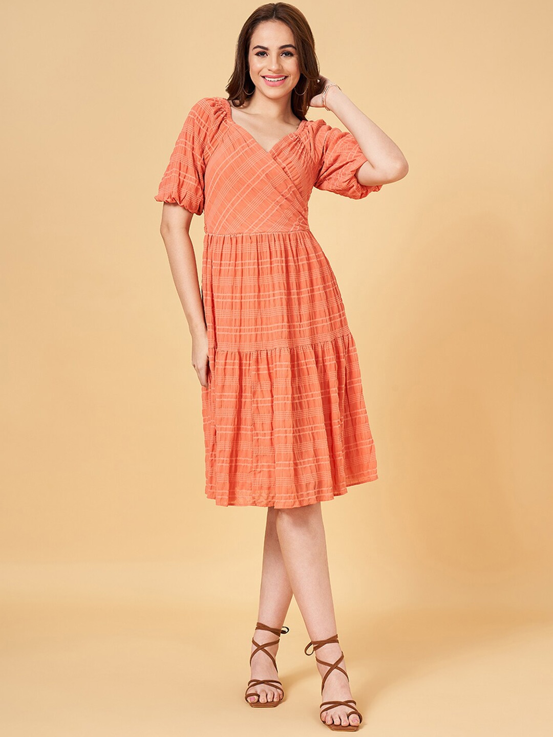 

Honey by Pantaloons Self Design Puff Sleeves Smocked Tie-Up Detail Gathered Wrap Dress, Peach