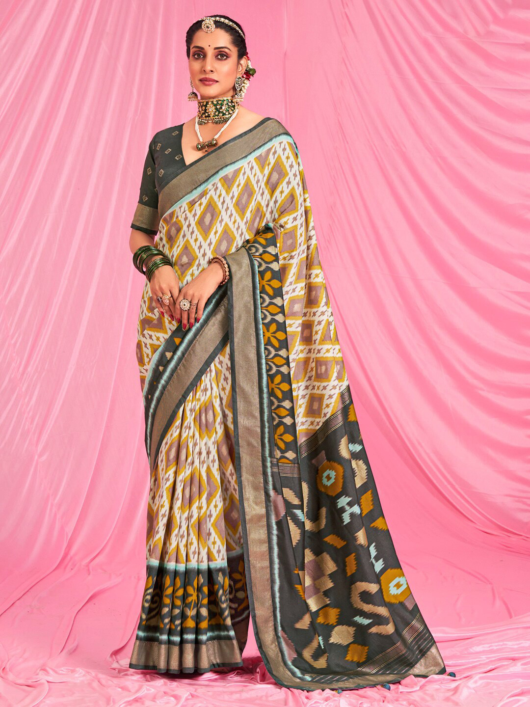 

Saree mall Off White & Green Geometric Printed Zari Ikat Sarees