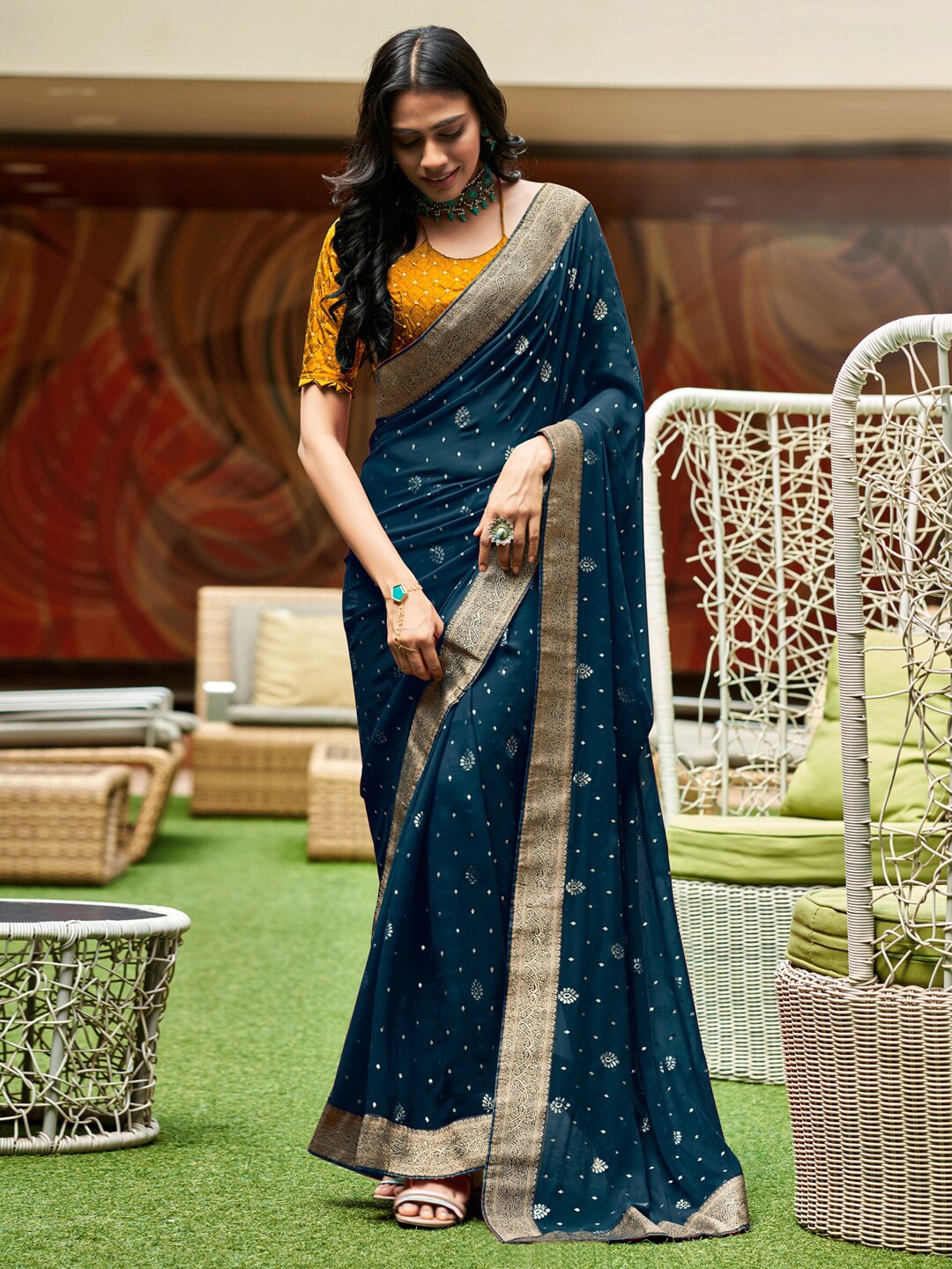 

Anouk Teal & Gold-Toned Ethnic Motifs Woven Design Sequinned Pure Georgette Saree