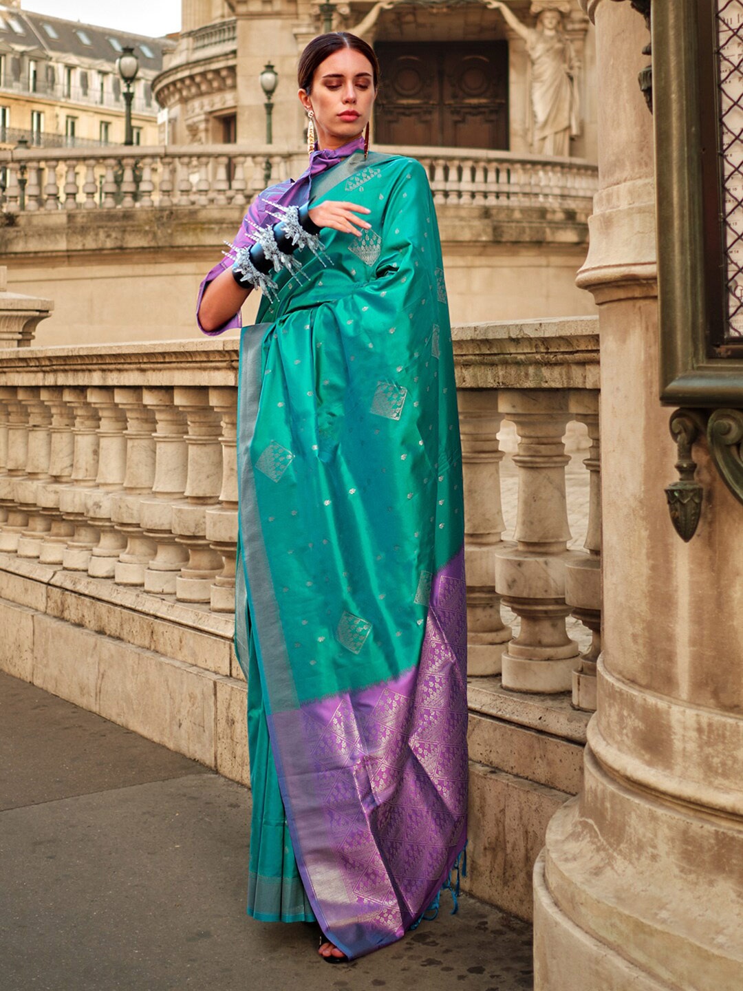 

Mitera Teal blue Ethnic Motifs Woven Design Zari Silk Banarasi Saree