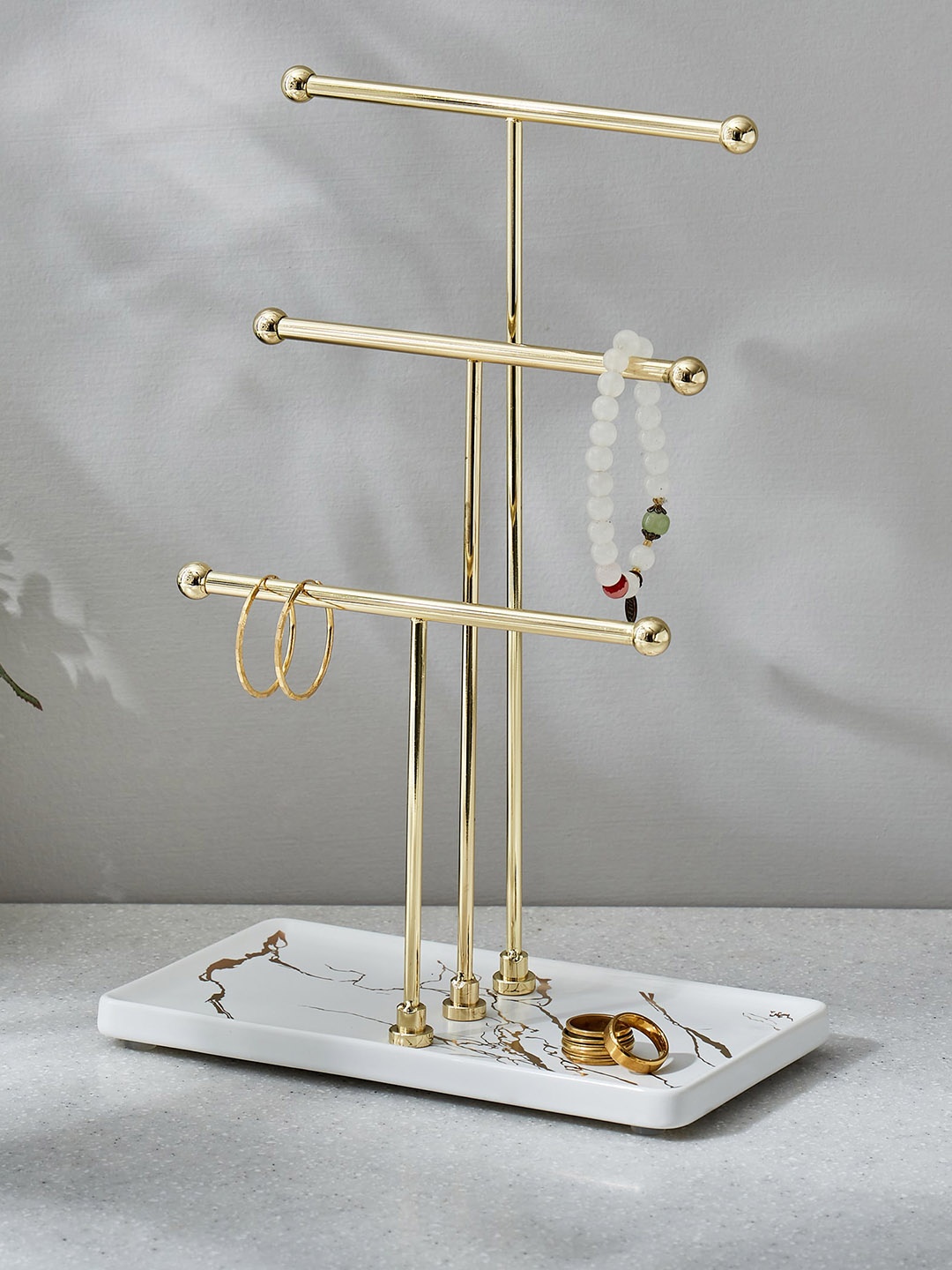 

Home Centre Gold-Toned Orion Orbit Iron Jewellery Stand