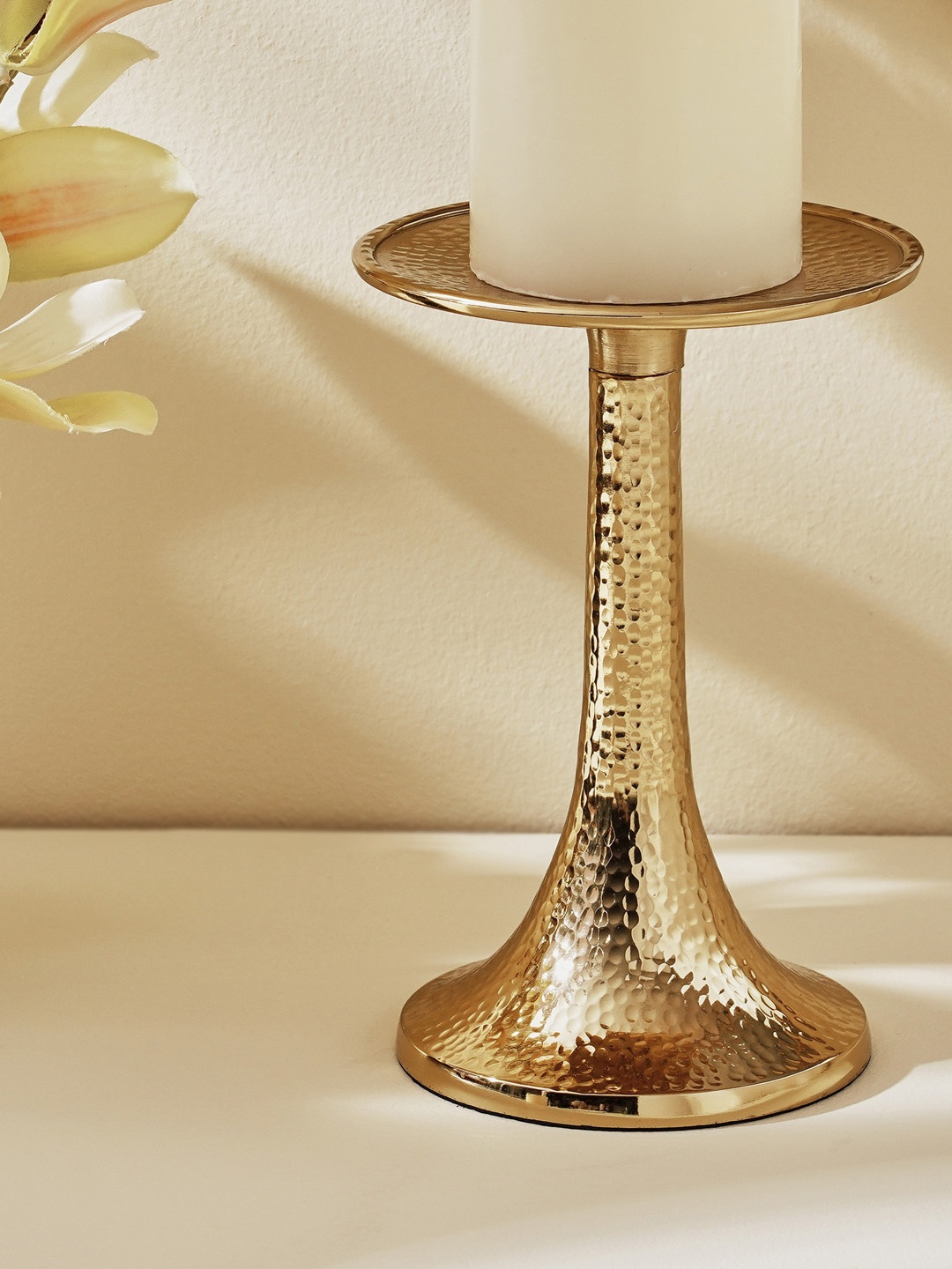 

Home Centre Splendid Gold Toned Metal Hammered Candle Stand