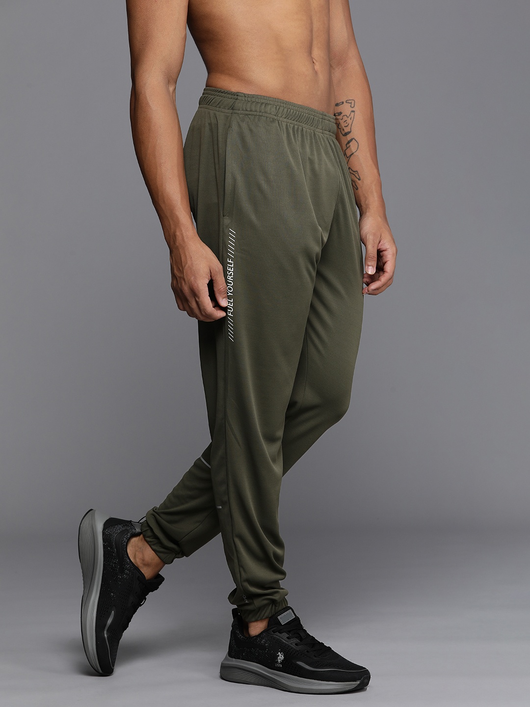 

HRX by Hrithik Roshan Men Solid Mid-Rise Rapid-Dry Training Joggers, Olive