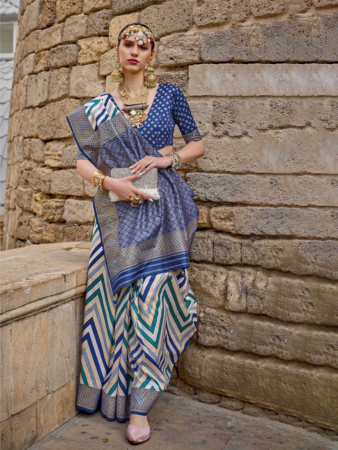 

Mitera Blue & White Woven Design Zari Patola Saree