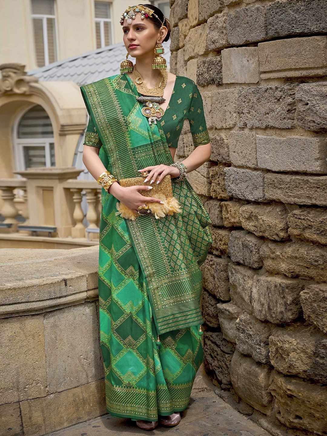 

Mitera Green & Gold-Toned Ethnic Motifs Woven Design Zari Patola Saree
