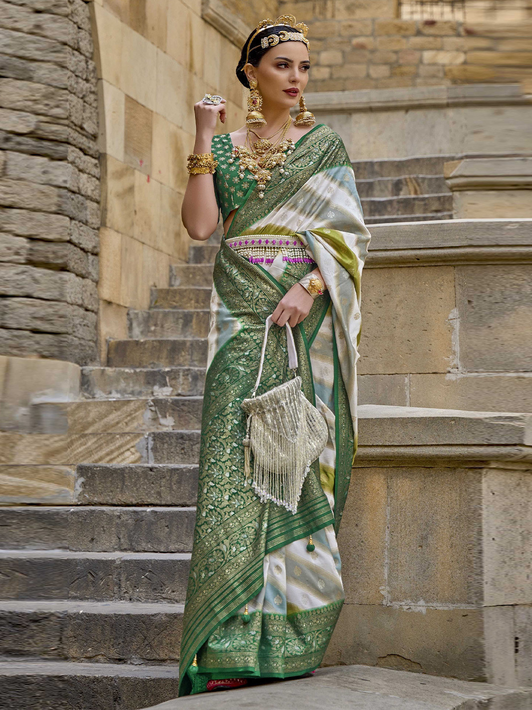 

Mitera Green & White Woven Design Zari Patola Saree