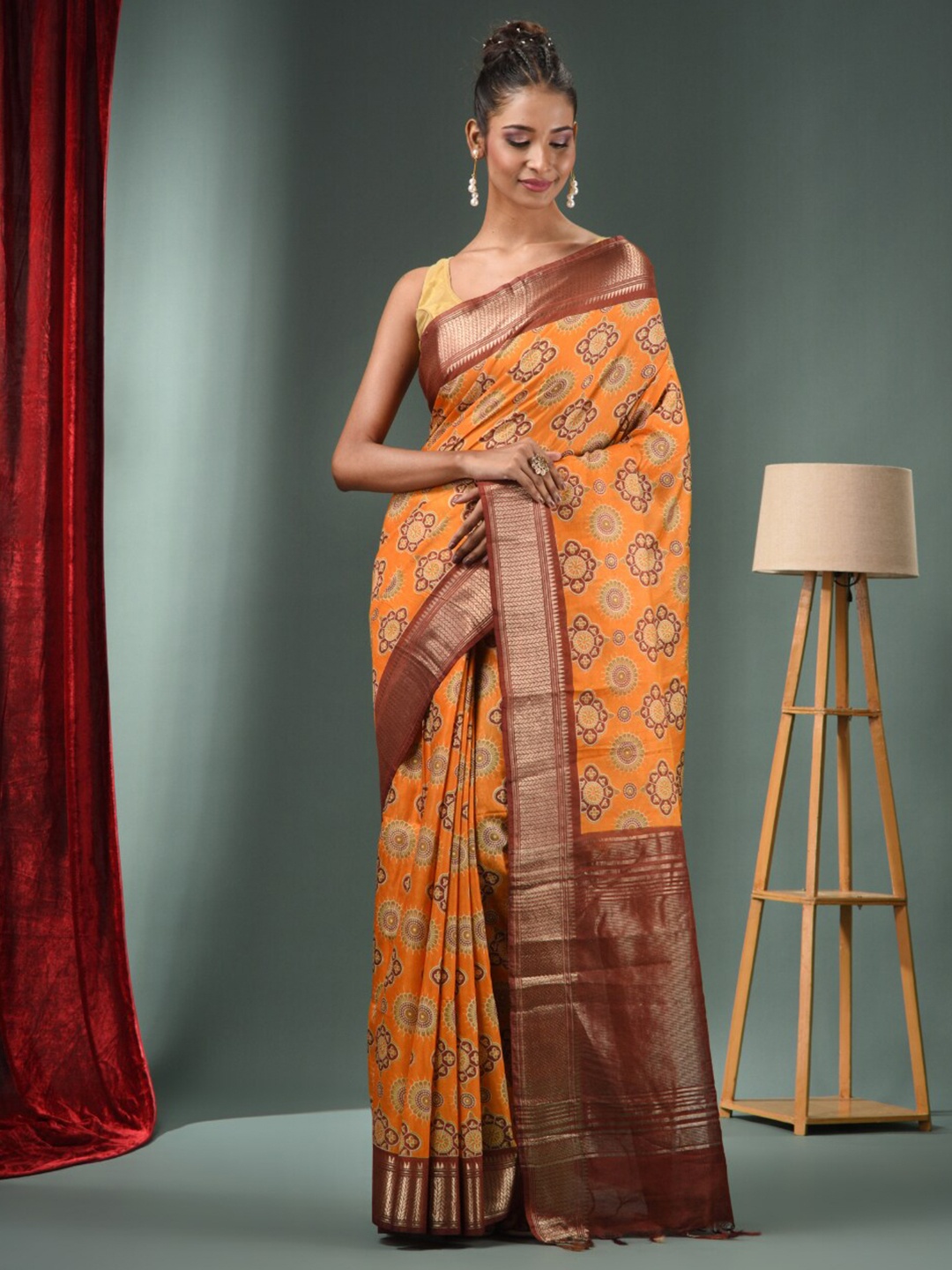 

Charukriti Ethnic Motifs Printed Zari Saree, Yellow