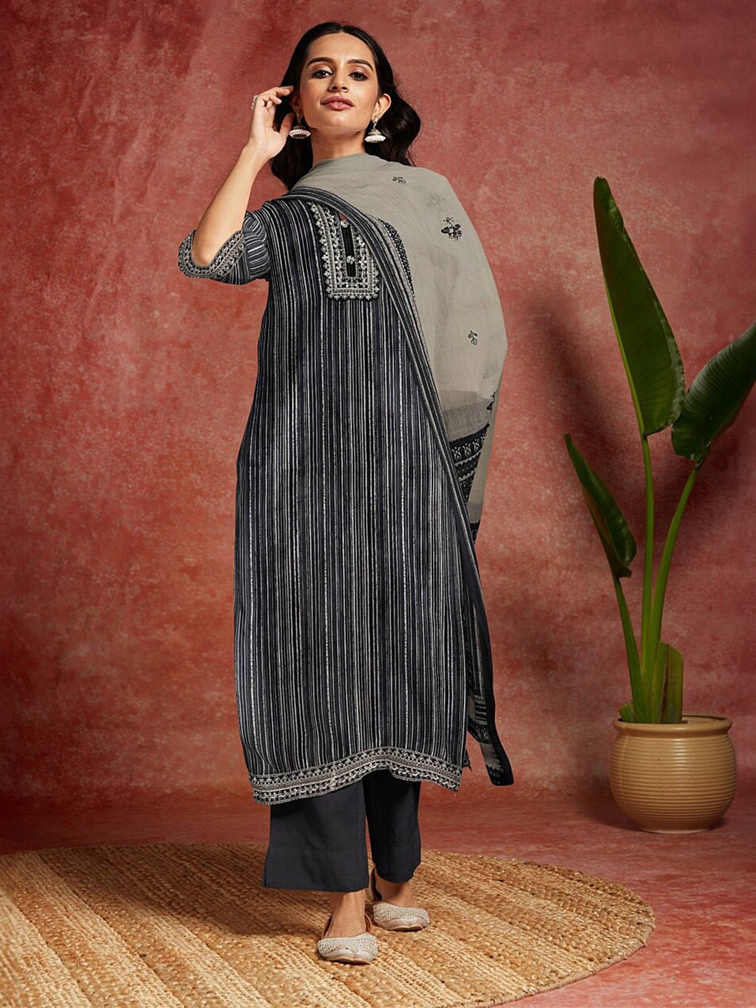 

Libas Black Striped Unstitched Dress Material