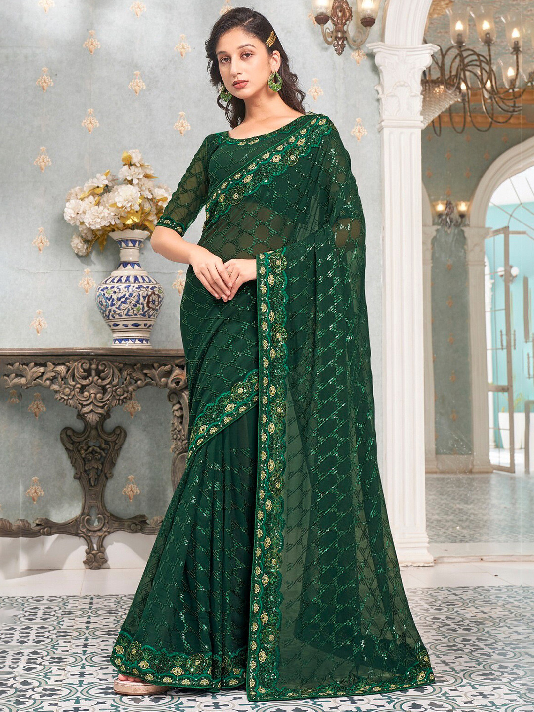 

Mitera Green Embellished Sequinned Pure Georgette Heavy Work Saree