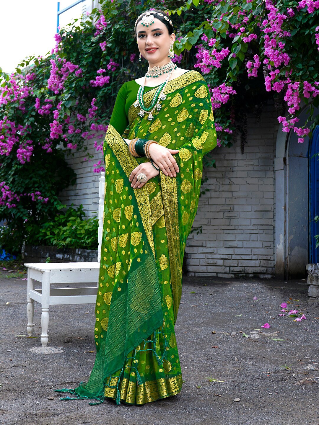 

Anouk Ethnic Motifs Zari Border Nylon Silk Tie and Die Saree, Green