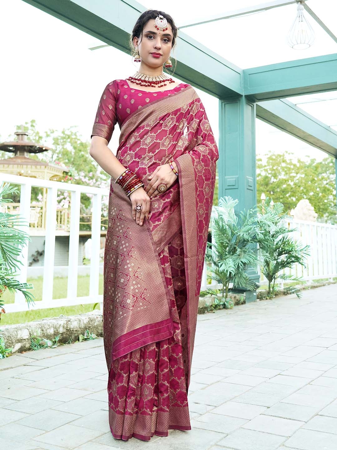 

Anouk Pink Woven Design Zari Organza Saree