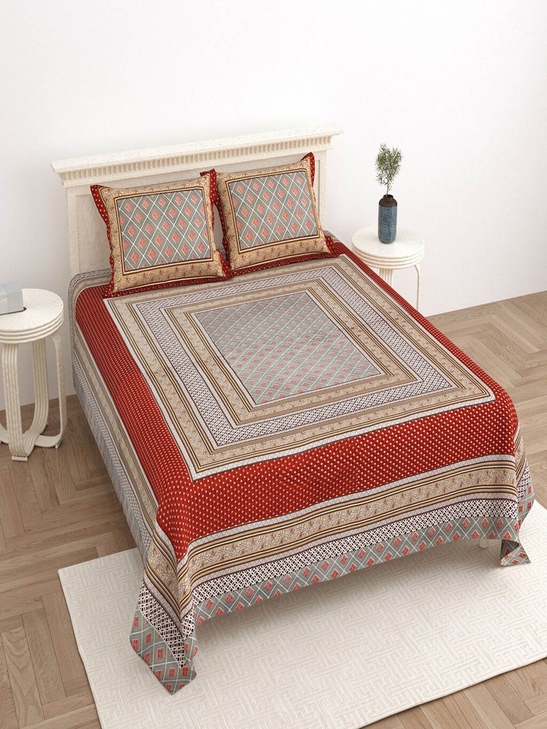 

Bombay Spreads Red & White Floral Cotton 180 TC King Bedsheet with 2 Pillow Covers
