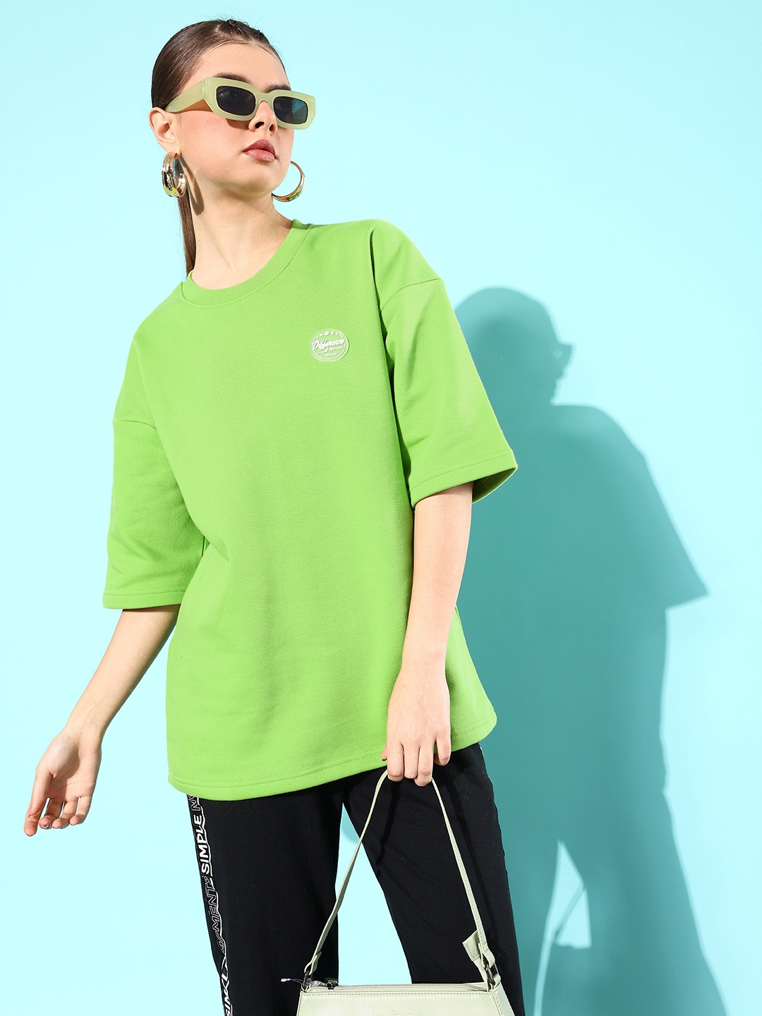 

Difference of Opinion Women Solid Sweatshirt, Green