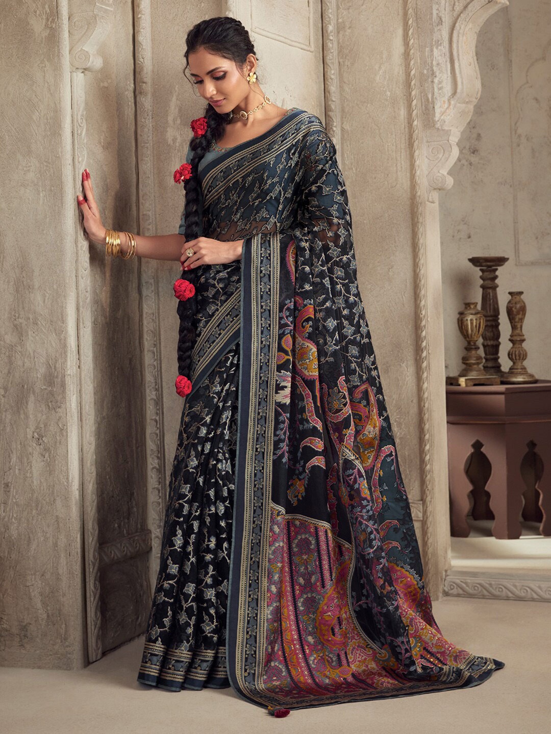 

Mitera Black & Red Ethnic Motifs Printed Brasso Saree