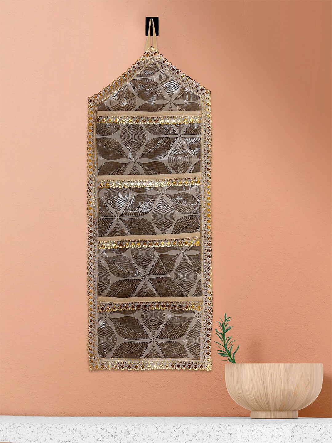 

Kuber Industries Beige & Brown Leaf Printed Wall Hanging Organizer