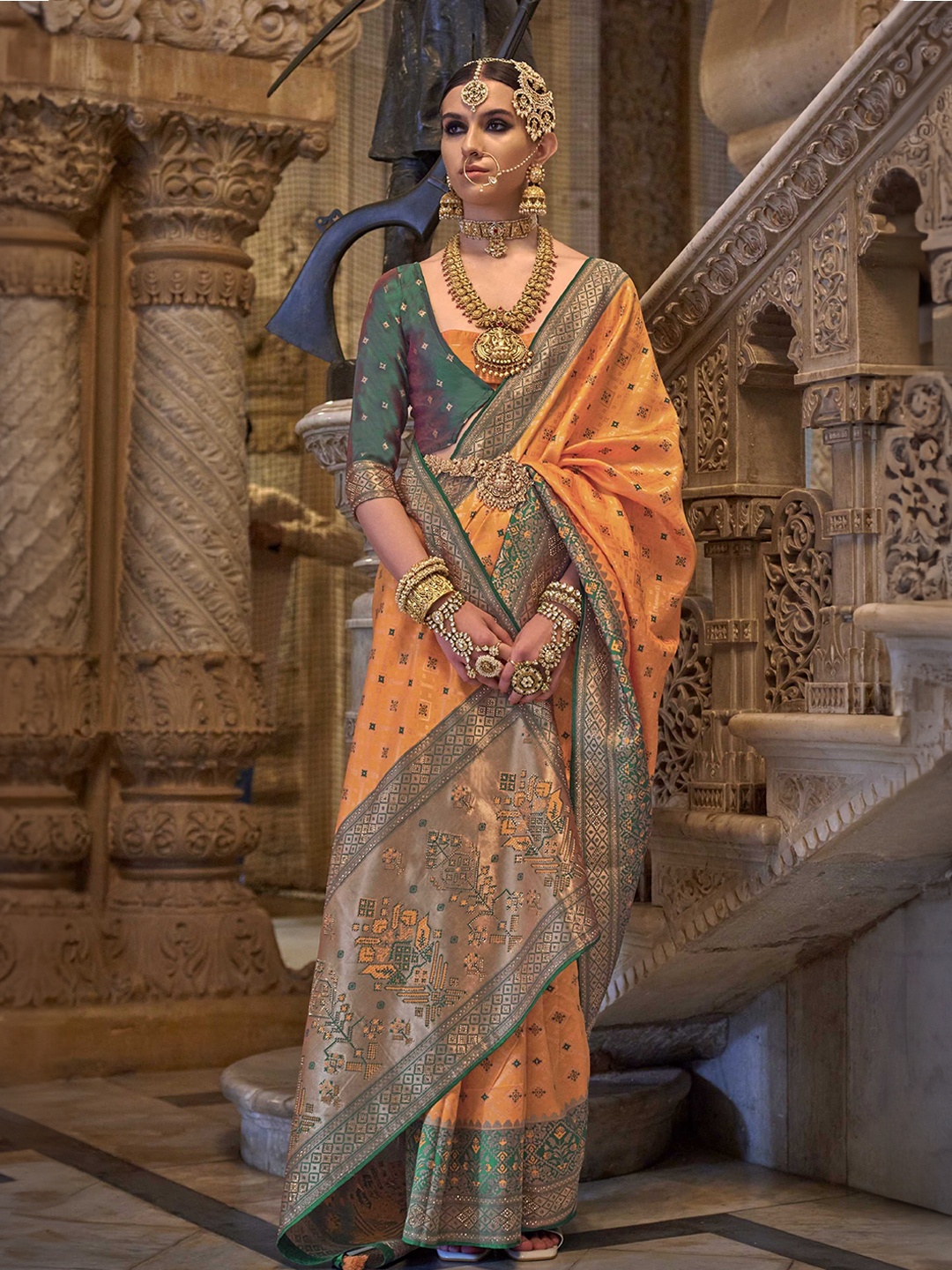 

Mitera Orange & Green Ethnic Motifs Printed Banarasi Saree