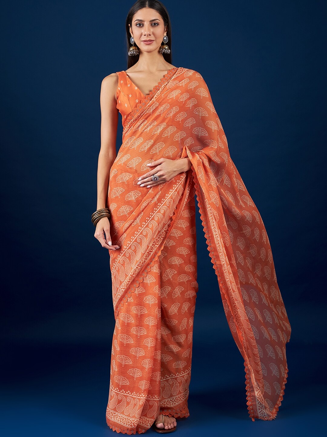 

Anouk Orange & White Floral Printed Pure Chiffon Saree