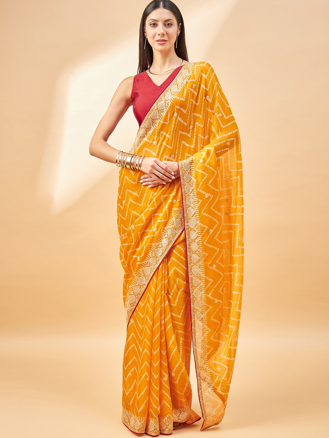 

Anouk Embroidered Pure Chiffon Bandhani Saree, Yellow