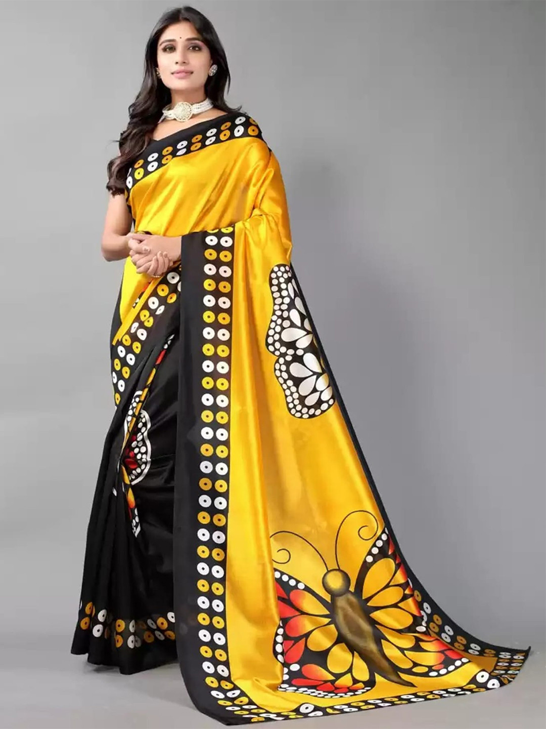 

Mitera Black & Yellow Ethnic Motifs Printed Saree