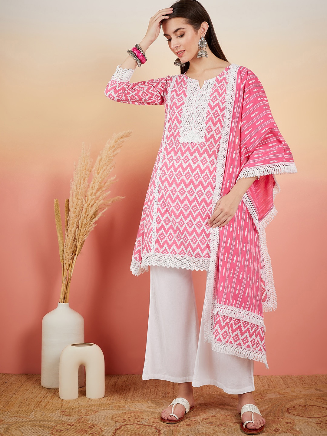 

Sangria Pink Chevron Printed Thread Work Pure Cotton A-Line Kurta & Palazzo With Dupatta