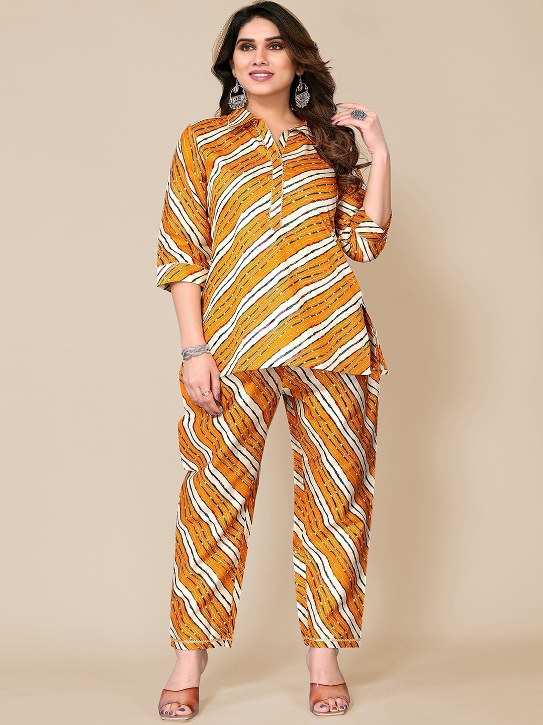 

TITANIUM SILK INDUSTRIES PVT. LTD. Striped Top With Trousers Co-Ords, Mustard
