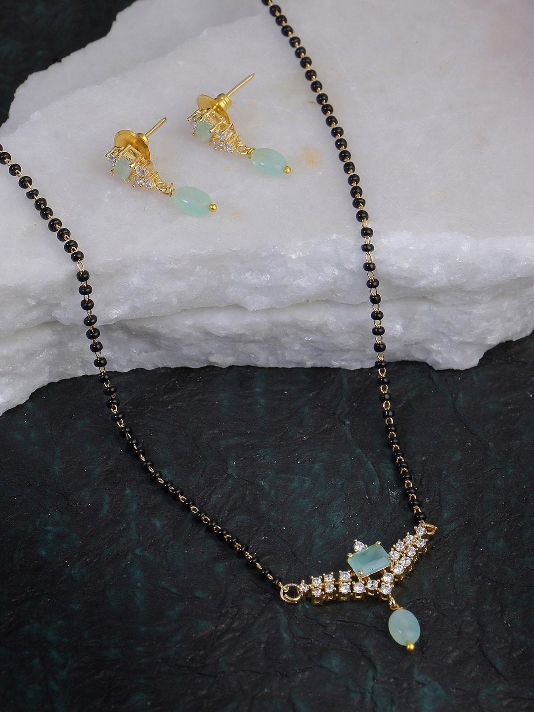 

Adwitiya Collection Gold-Plated Stones-Studded & Beaded Mangalsutra Set