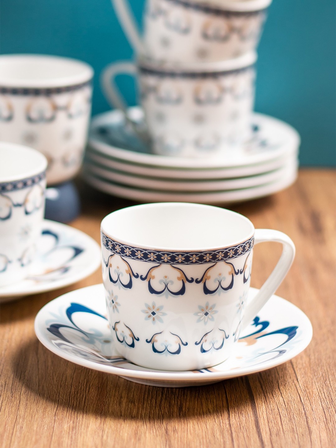 

CLAY CRAFT Premium White 12 Pieces Printed Ceramic Glossy Cups and Saucers