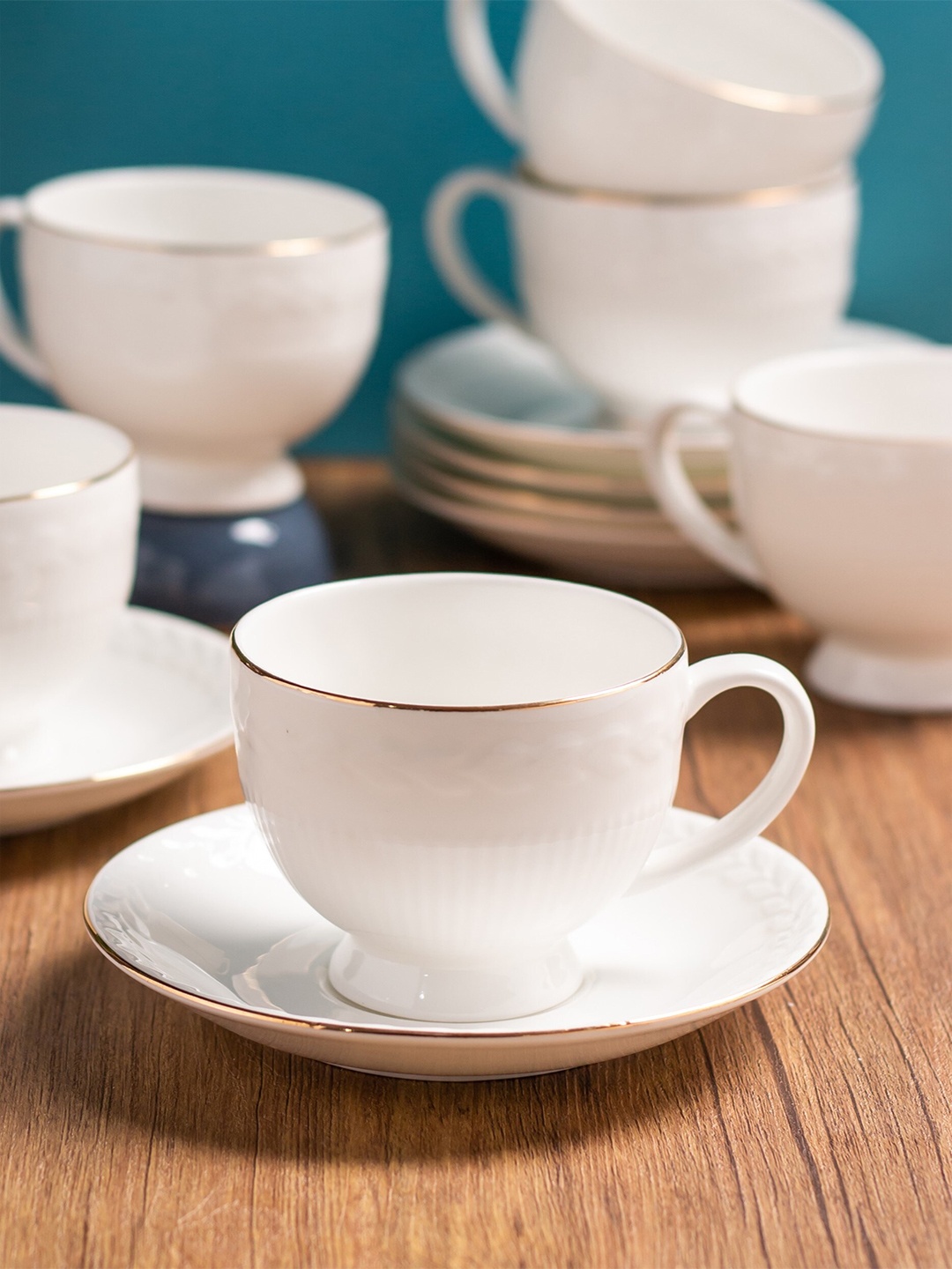 

CLAY CRAFT White 12 Pieces Printed Ceramic Glossy Cups and Saucers - 180 ML Each