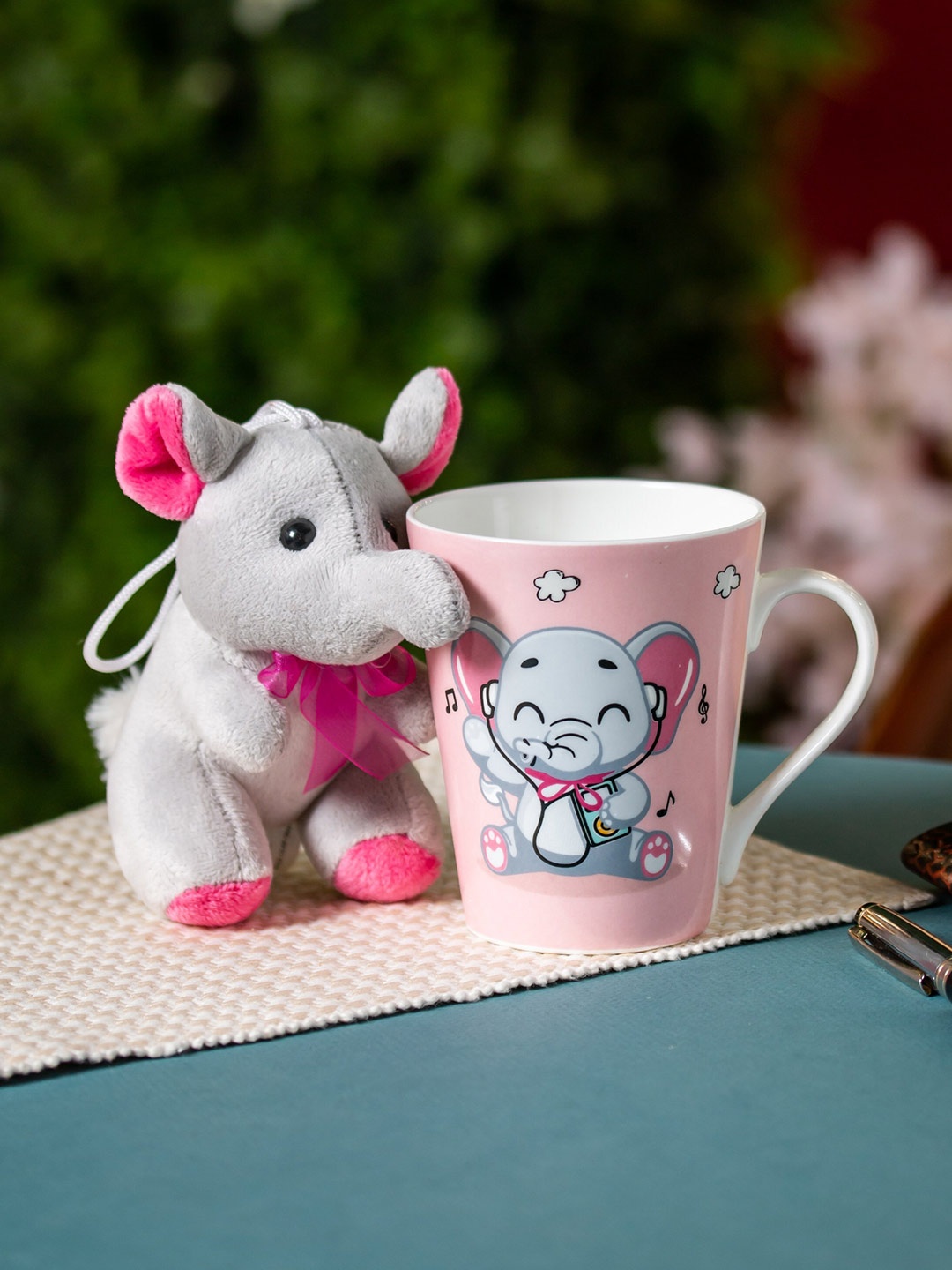 

CLAY CRAFT Pink & Grey Printed Ceramic Glossy Milk Mug With Toy - 340 ML