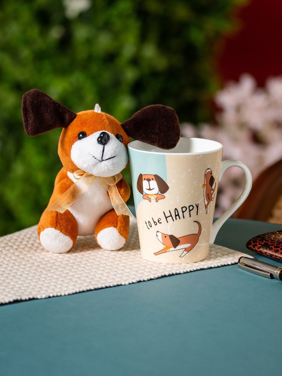 

CLAY CRAFT Beige & Blue Printed Ceramic Glossy Mug With Toy 340 ml