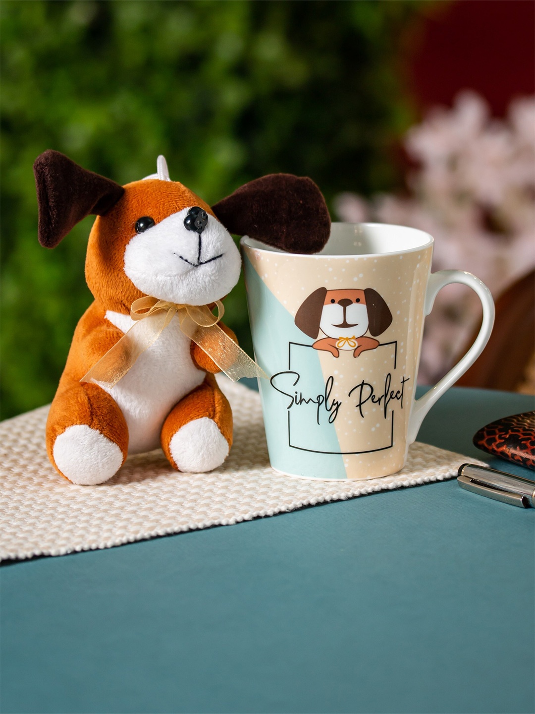 

CLAY CRAFT Beige & Blue Printed Ceramic Glossy Mug With Toy 340 ml
