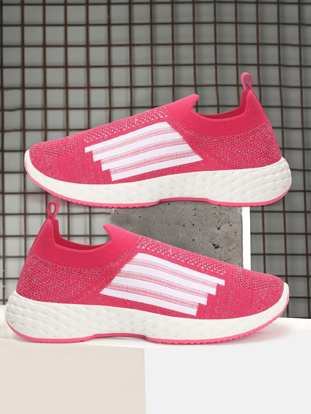 

Carlton London sports Women Textured Lightweight Slip On Sneakers, Fuchsia
