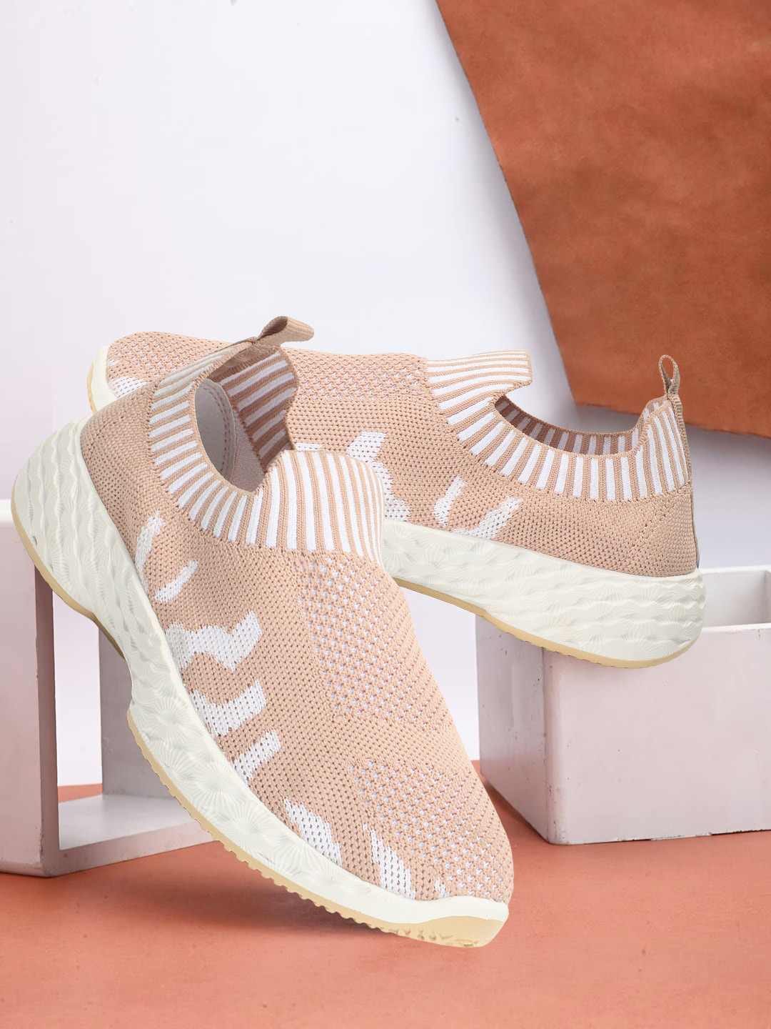 

Carlton London sports Women Textured Lightweight Slip-On Sneakers, Beige