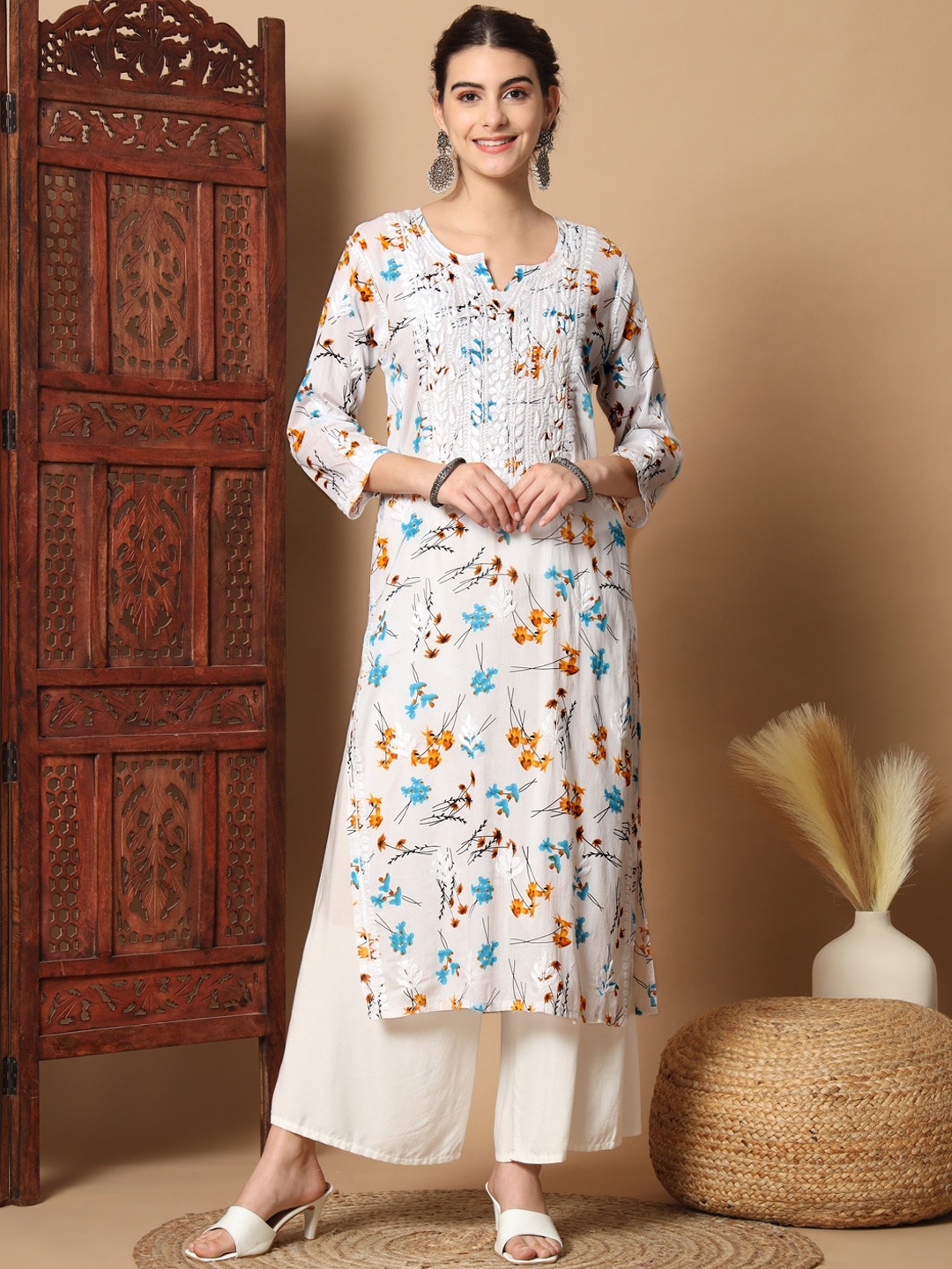 

Ethnava Floral Printed Thread Work Detail Cotton Straight Kurta, Blue