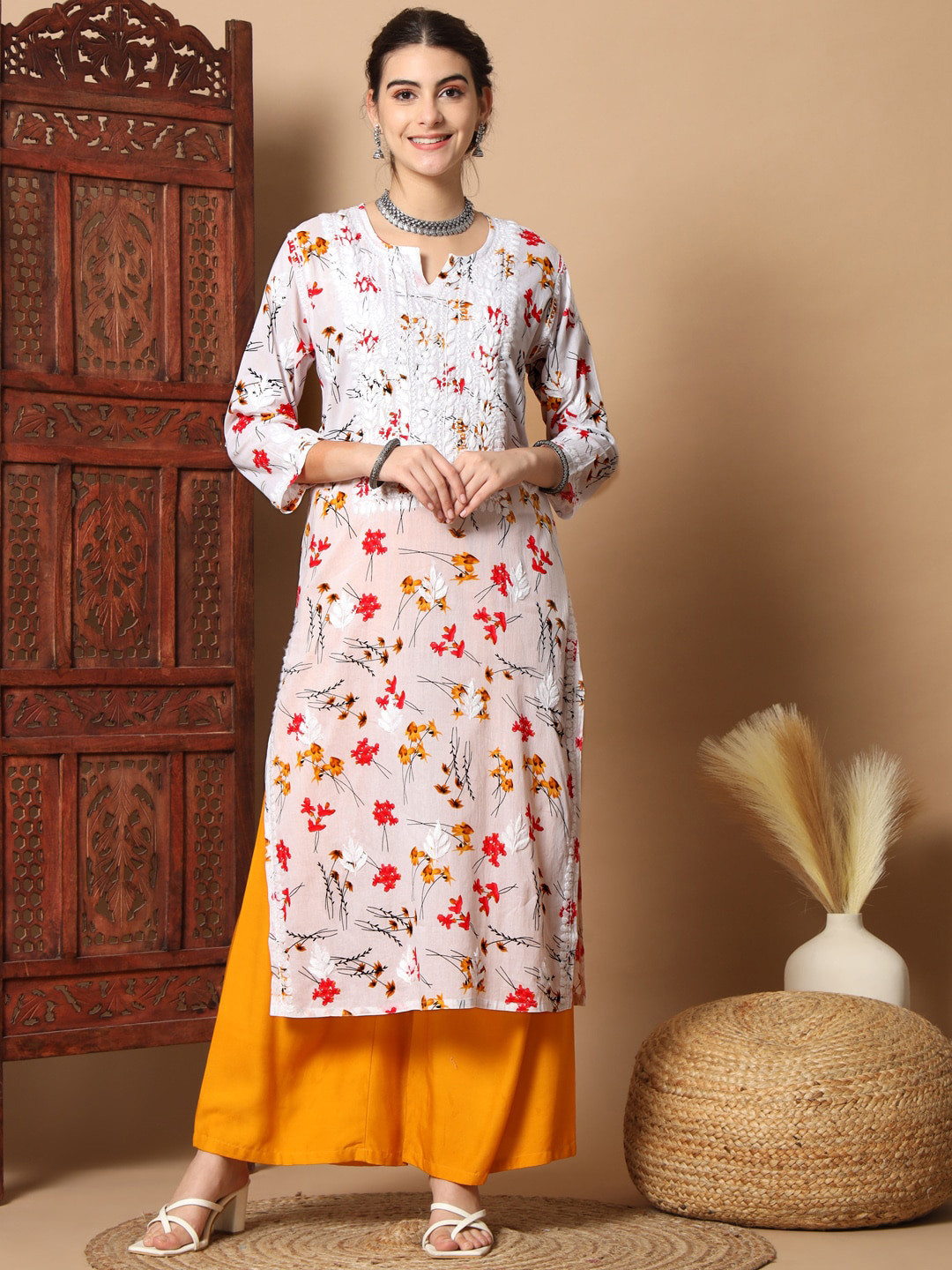 

Ethnava Floral Printed Thread Work Detail Cotton Straight Kurta, Red
