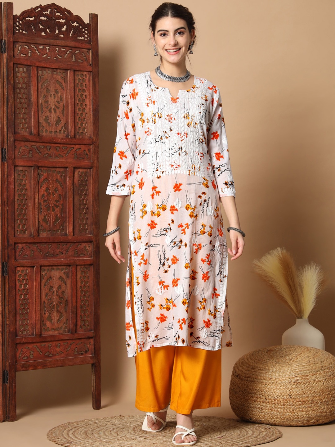 

Ethnava Floral Printed Thread Work Detail Cotton Straight Kurta, Orange