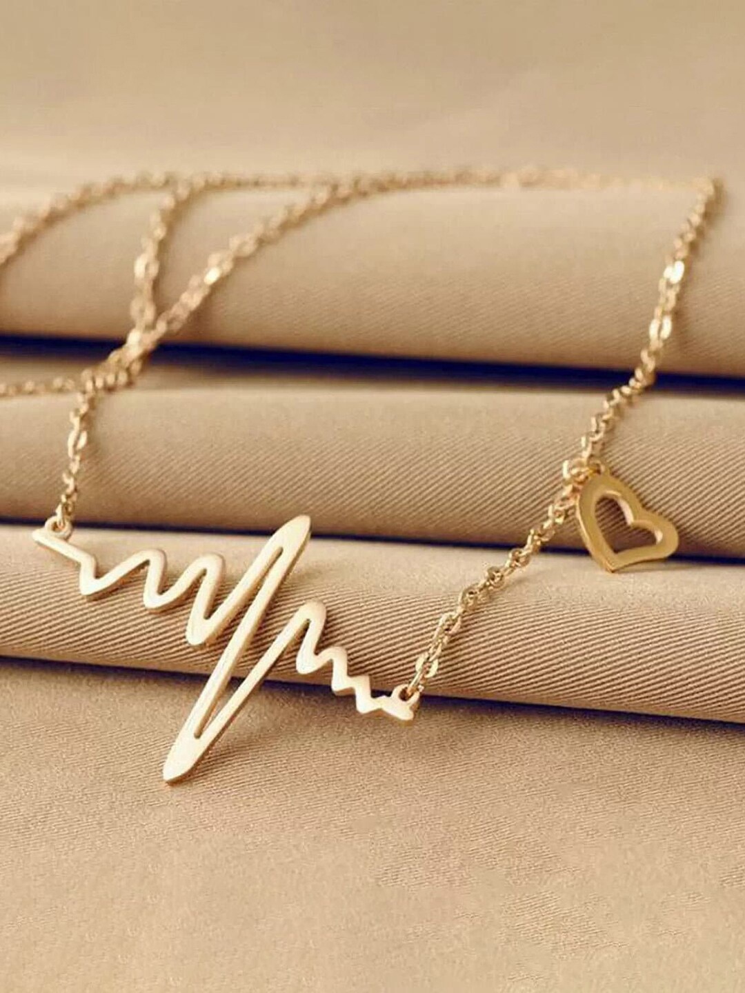 

Krelin Gold Plated Heartbeat Pendant Necklace