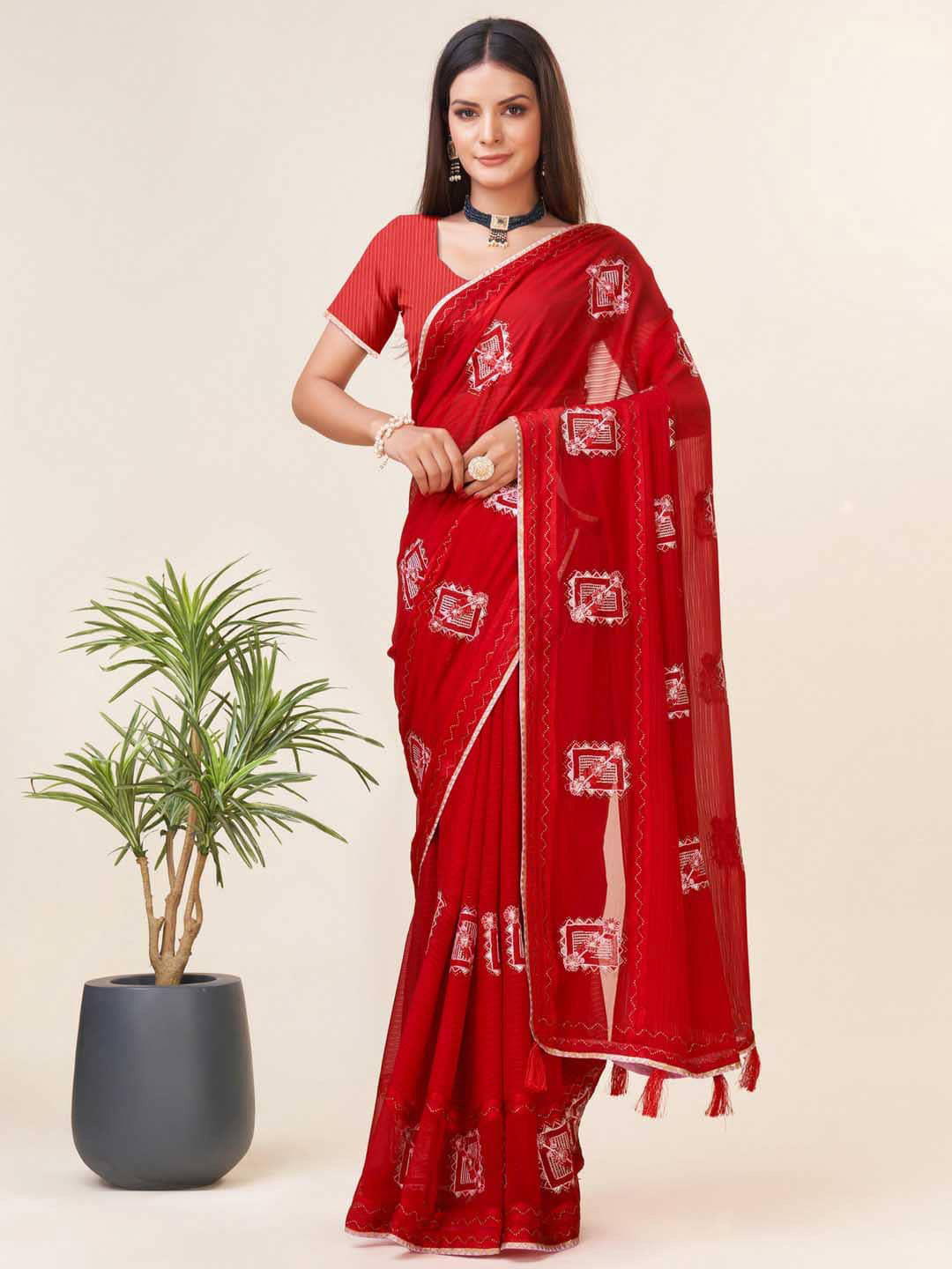 

Mitera Red & Silver-Toned Ethnic Motifs Embroidered Pure Georgette Saree