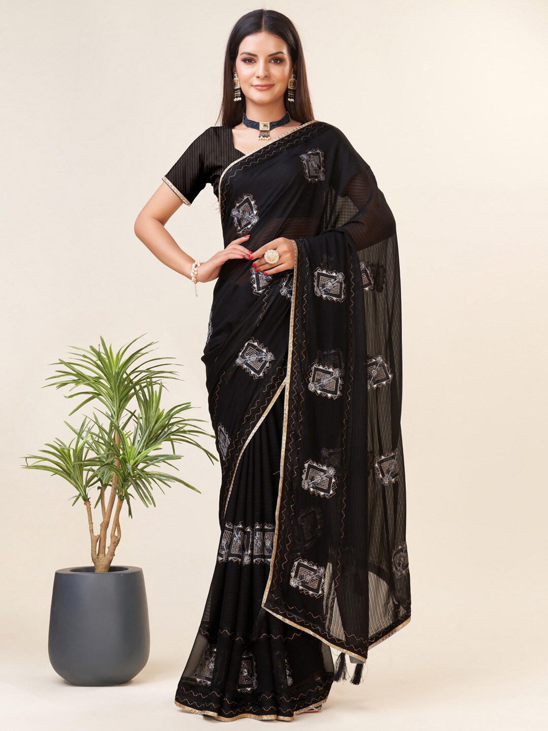 

Mitera Black Ethnic Motifs Embroidered Zari Pure Georgette Saree