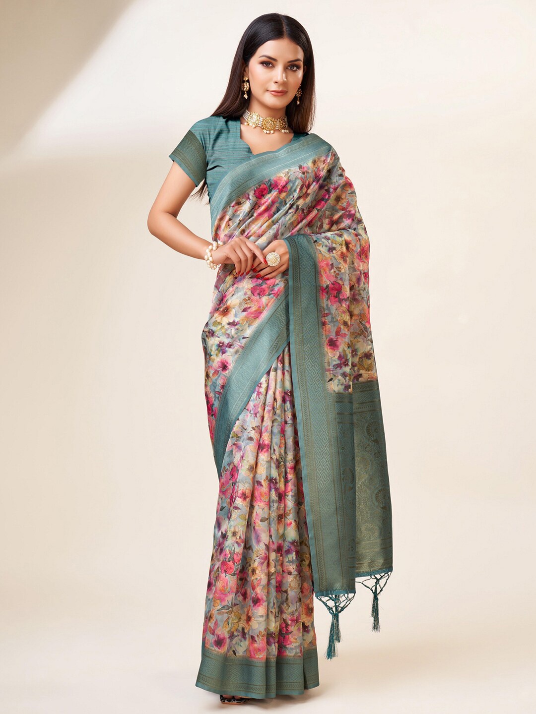 

Mitera Turquoise Blue & Pink Floral Woven Design Zari Organza Saree
