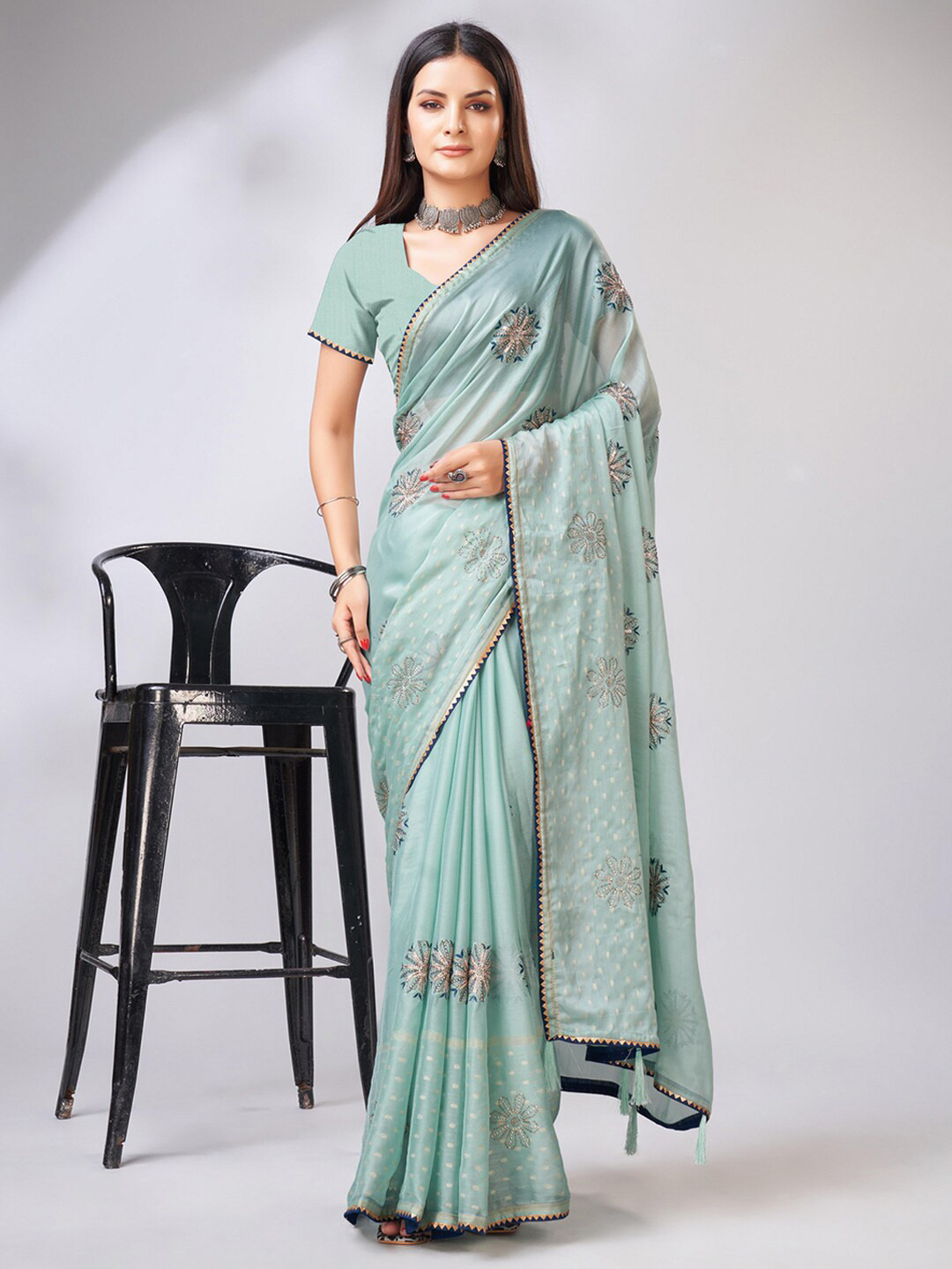 

Mitera Blue Ethnic Motifs Embroidered Saree