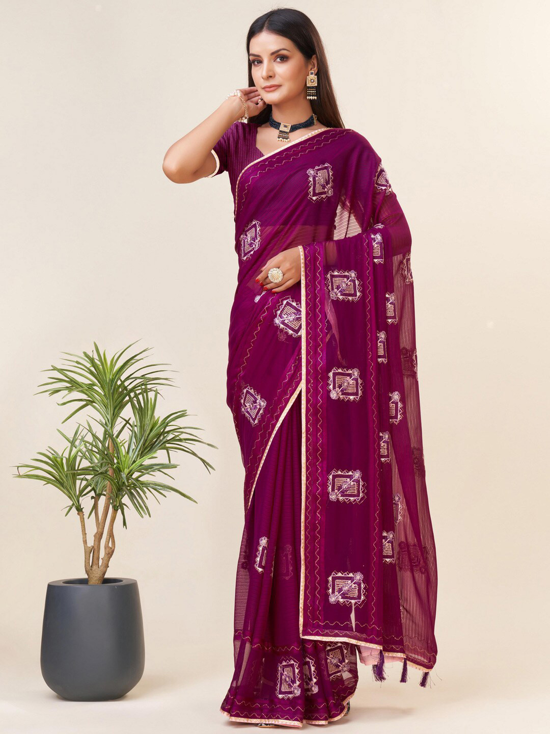 

Mitera Purple Geometric Embroidered Pure Georgette Saree
