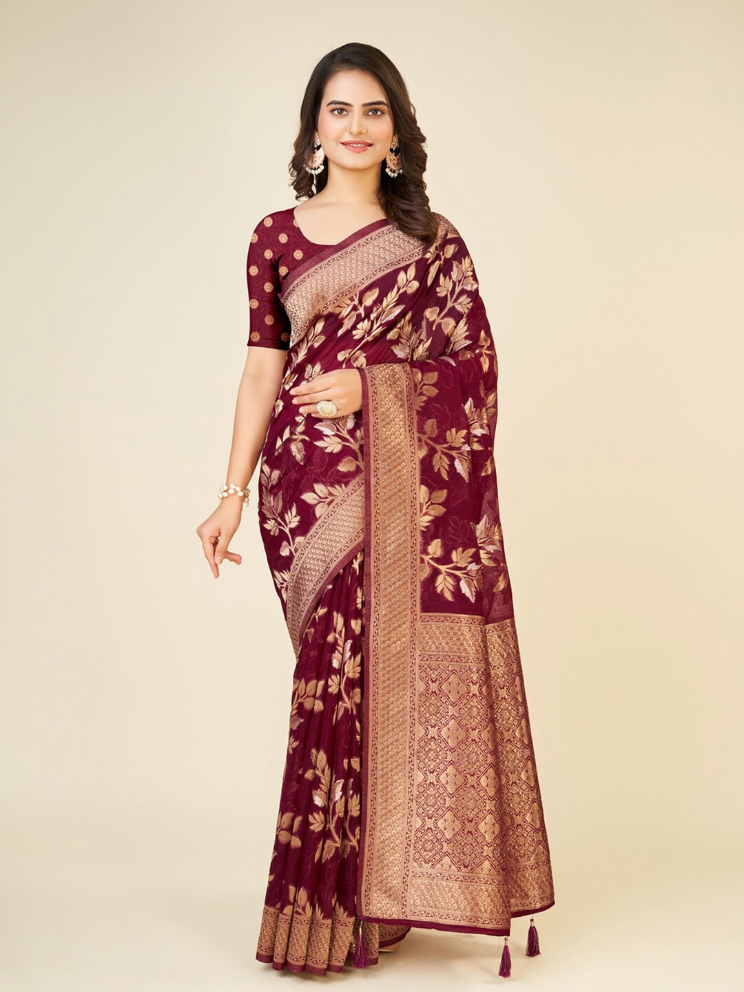 

Mitera Purple & Gold-Toned Ethnic Motif Woven Design Zari Organza Saree