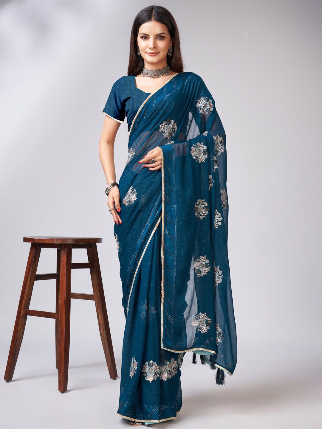 

Mitera Turquoise Blue Floral Embroidered Pure Georgette Saree