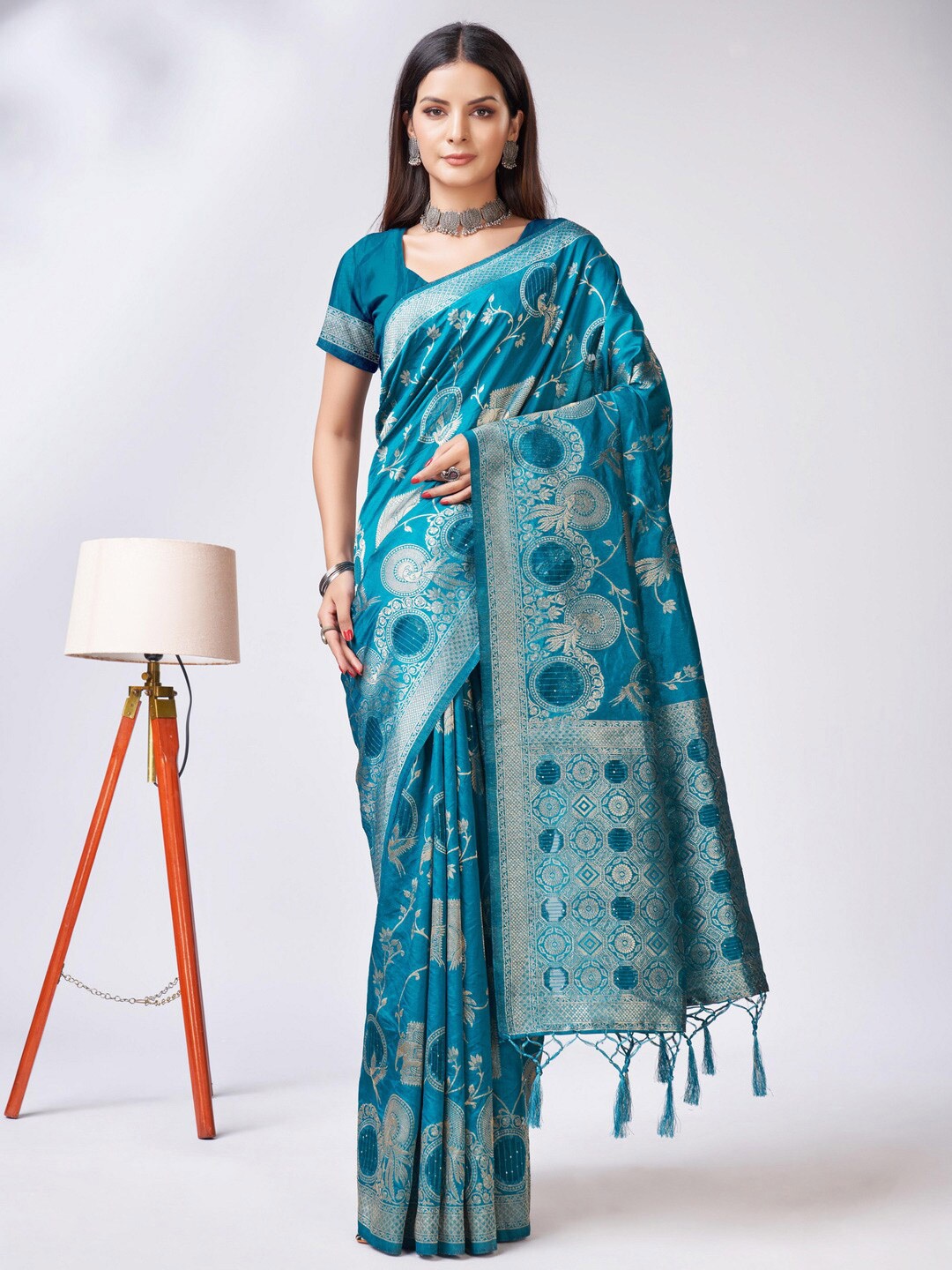 

Mitera Turquoise Blue & Silver-Toned Ethnic Motifs Woven Design Zari Organza Saree